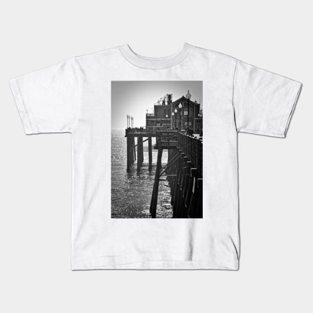 Fishing Off The End Of The Pier Kids T-Shirt by KirtTisdale